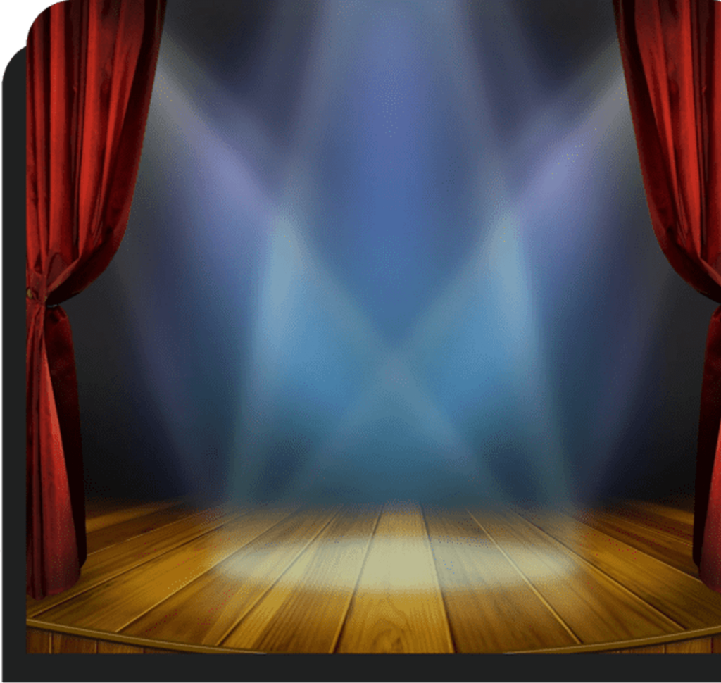 A stage with red curtains and blue lights